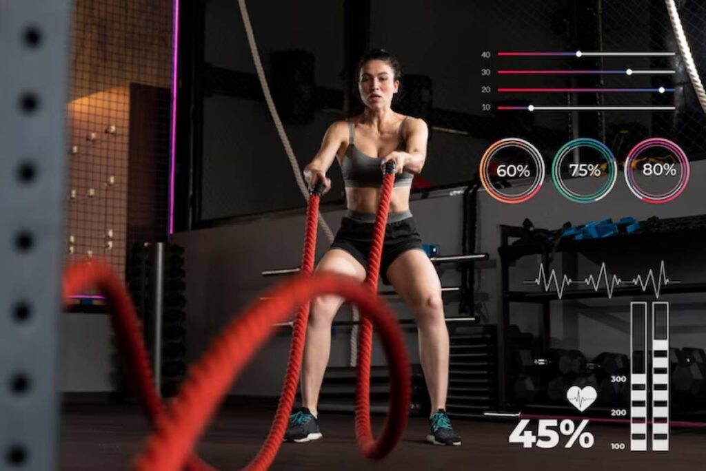 A person performs an intense workout using battle ropes in a gym, with fitness metrics displayed on the side.
